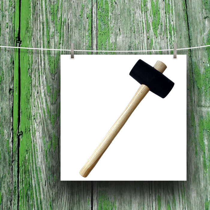 Rubber hammer with wooden handle, 40 mm diameter.