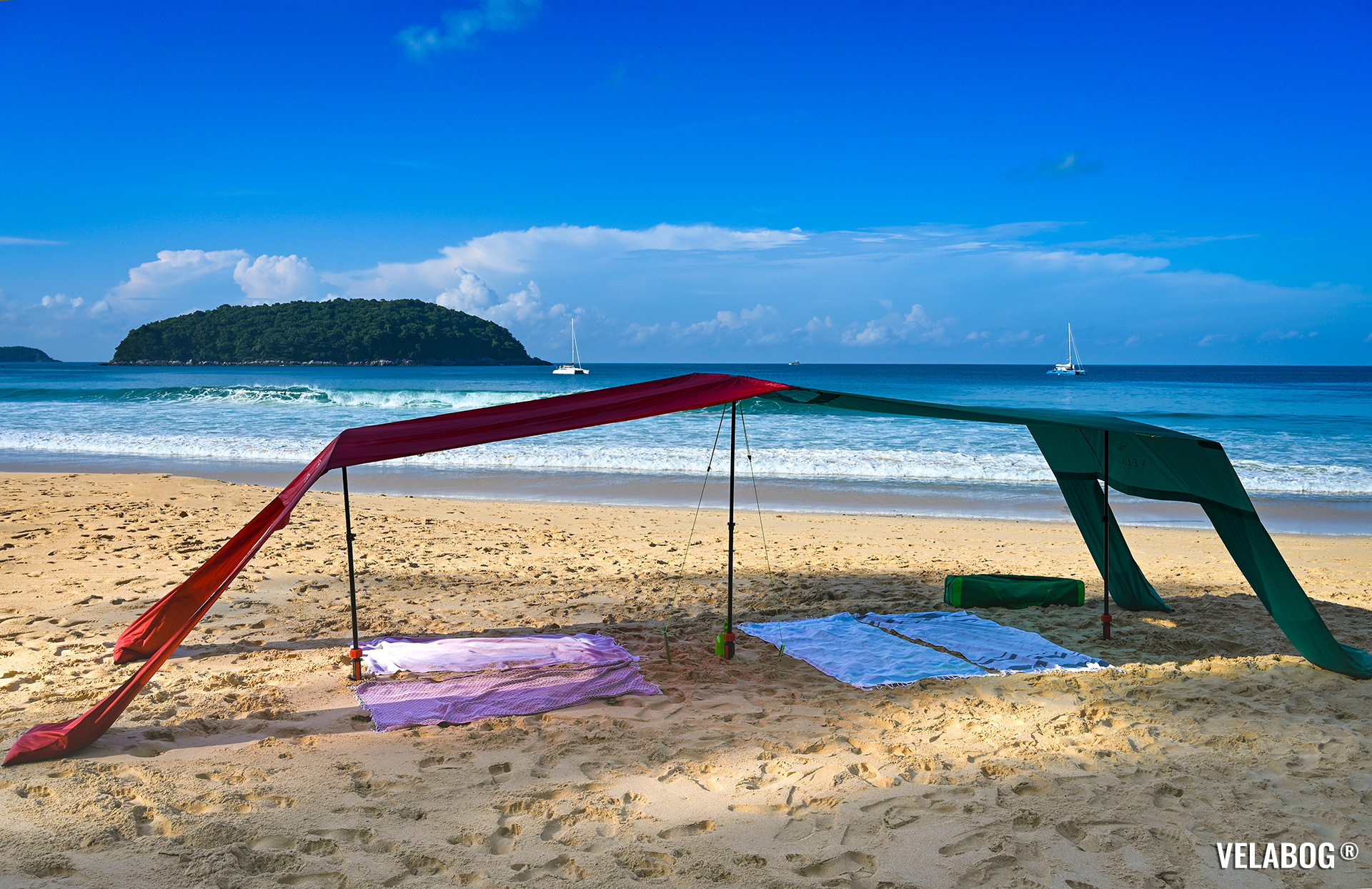 Combination of two beach sun sails Velabog Breeze. Best sun shelter beach canopy tent on the beach with a lot of shadow for family and friends. Setup option with extension set and second beach sun sail. No or leight wind. Full view.
