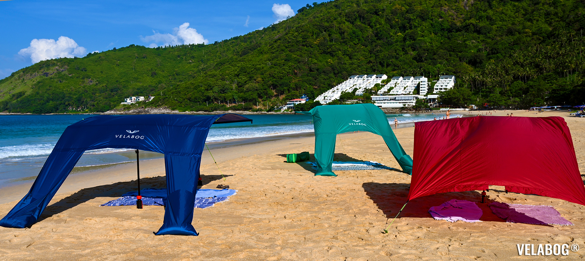 Beach sun sail Velabog Breeze shows varying setup options. Best beach sun canopy tent, best flexible sun shelter on the beach.