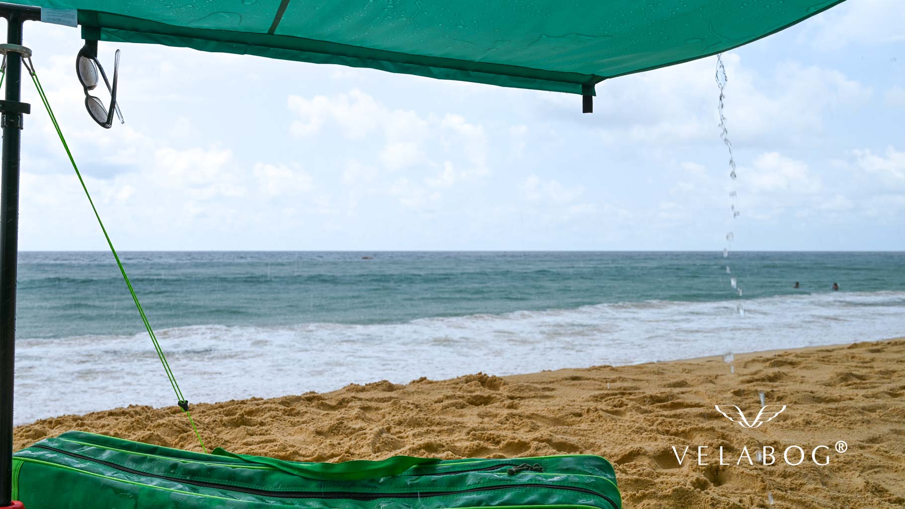 Beach sun sail Velabog Breeze on the beach is also a shelter against a short tropical rain. Beach sun sail, beach umbrella and beach tent in one. You have best beach canopy to really enjoy the beach without worry.