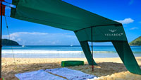 Beach sun sail Velabog Breeze, green, in combination with a second beach sun sail on the beach. Combination with the help of an extension set to create a giant beach tent with plenty of shadow for the whole family and friends. Best beach canopy.